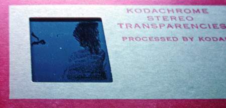 Stereo slide showing a light greasy dust film before cleaning